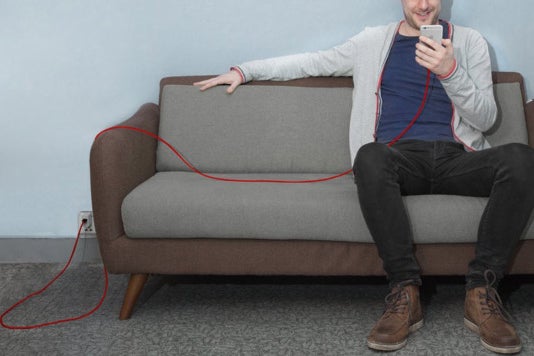 Man using the Anker PowerLine+ Lightning Cable.